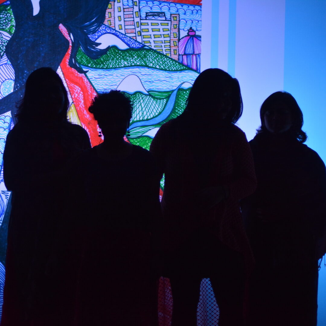 Group of women on stage during performance